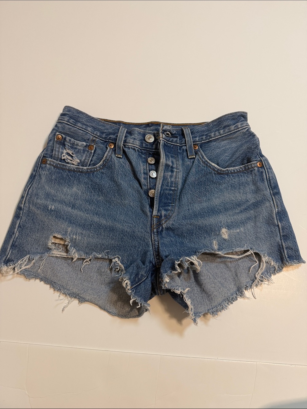 Levi's Distressed Medium Blue Denim Cutoff Shorts